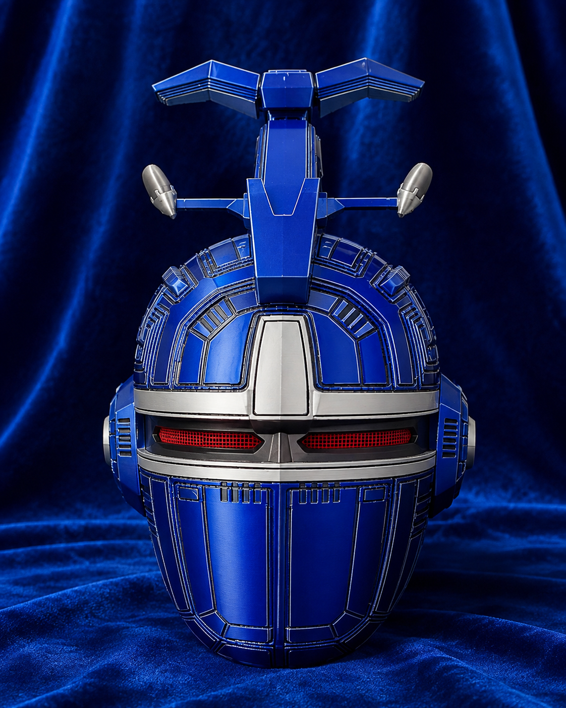 Big Bad Beetleborgs Blue Beetleborg finished cosplay helmet, front view on blue velvet