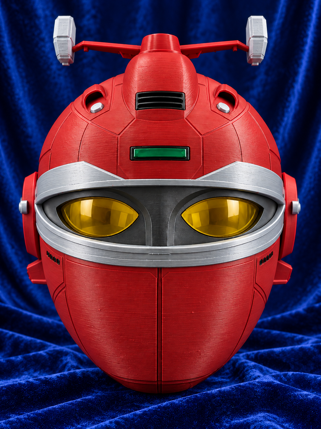 Big Bad Beetleborgs Red Beetleborg finished cosplay helmet, front view on blue velvet