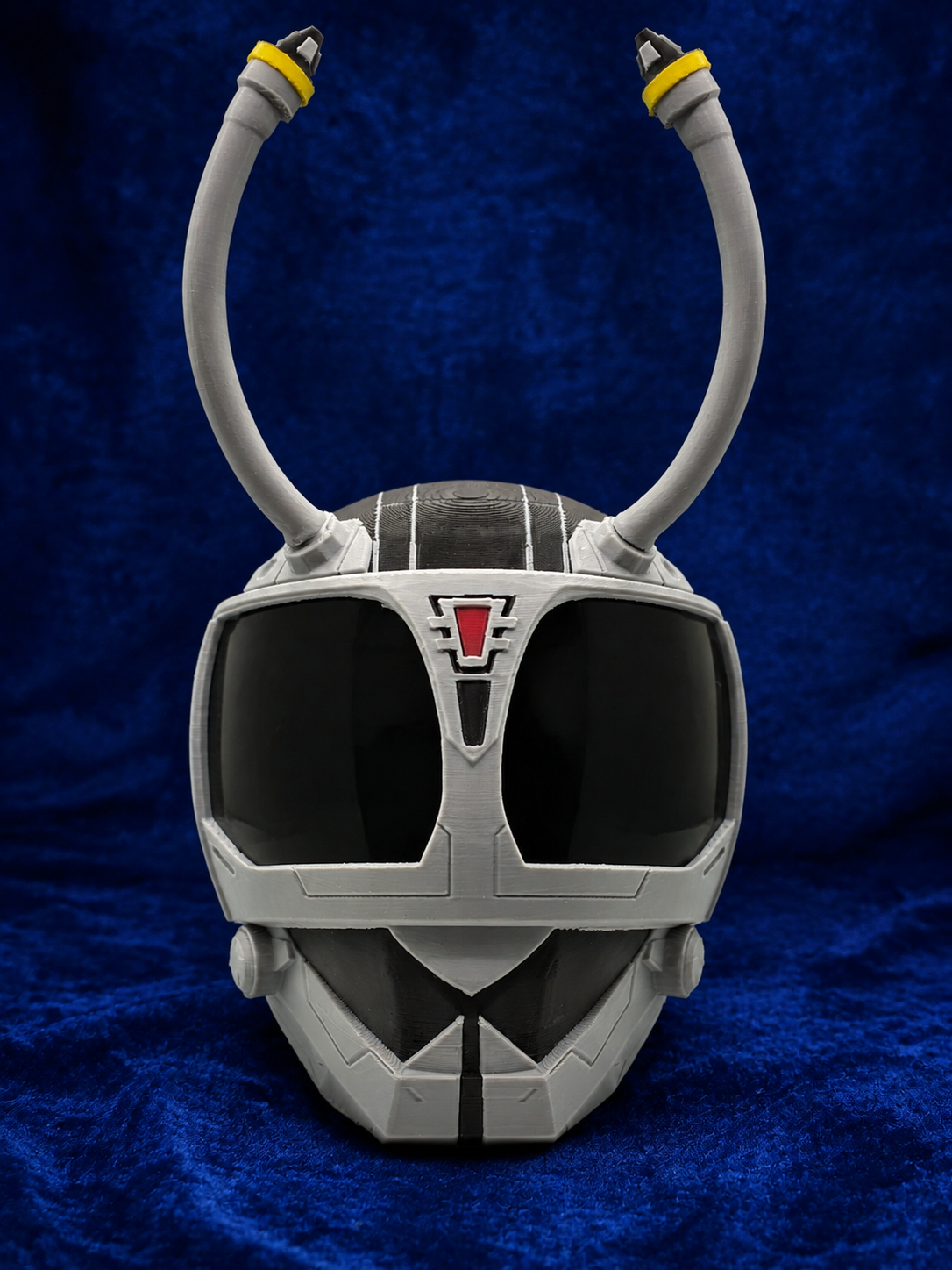 Big Bad Beetleborgs Shadowborg finished cosplay helmet, front view on blue velvet