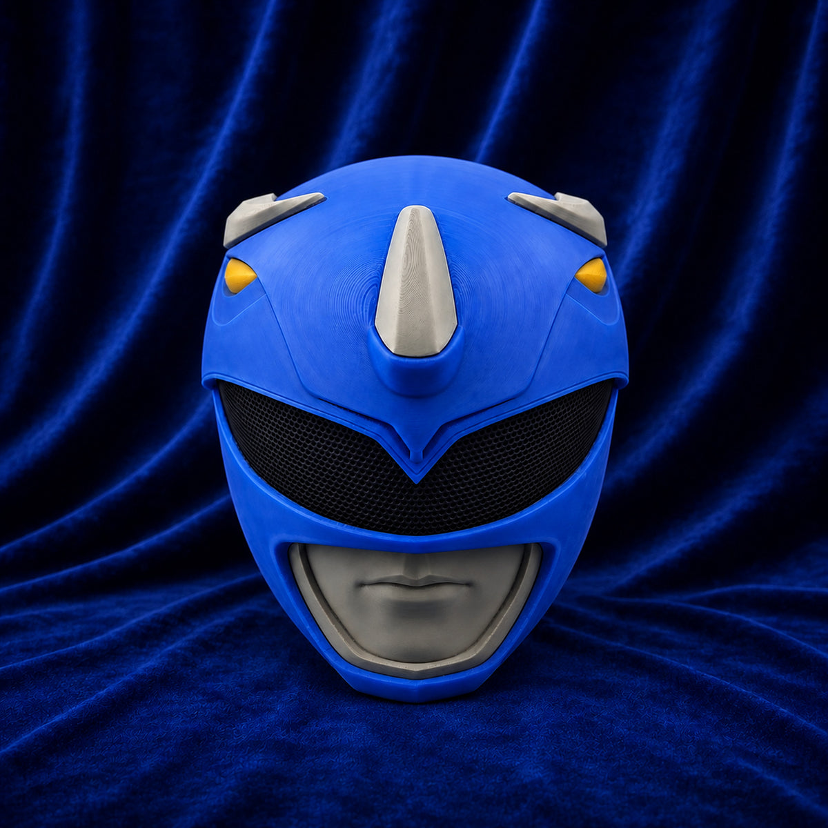 MMPR Blue Ranger fully assembled 3D printed helmet, front view on blue velvet